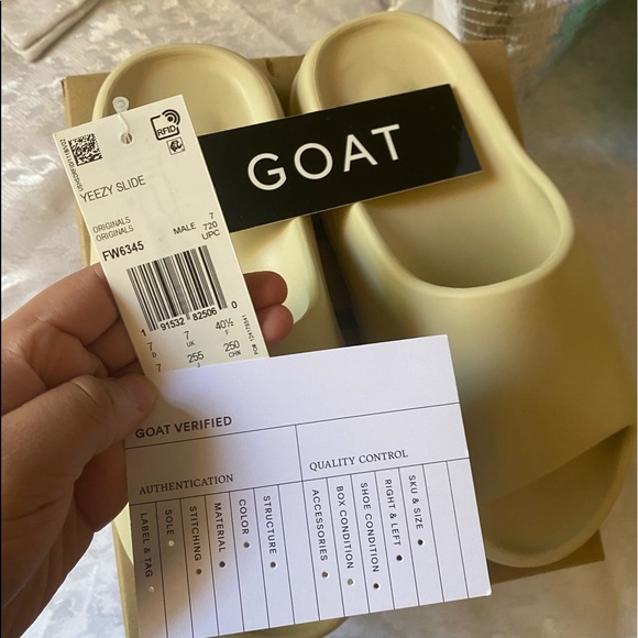 goat yeezy slides